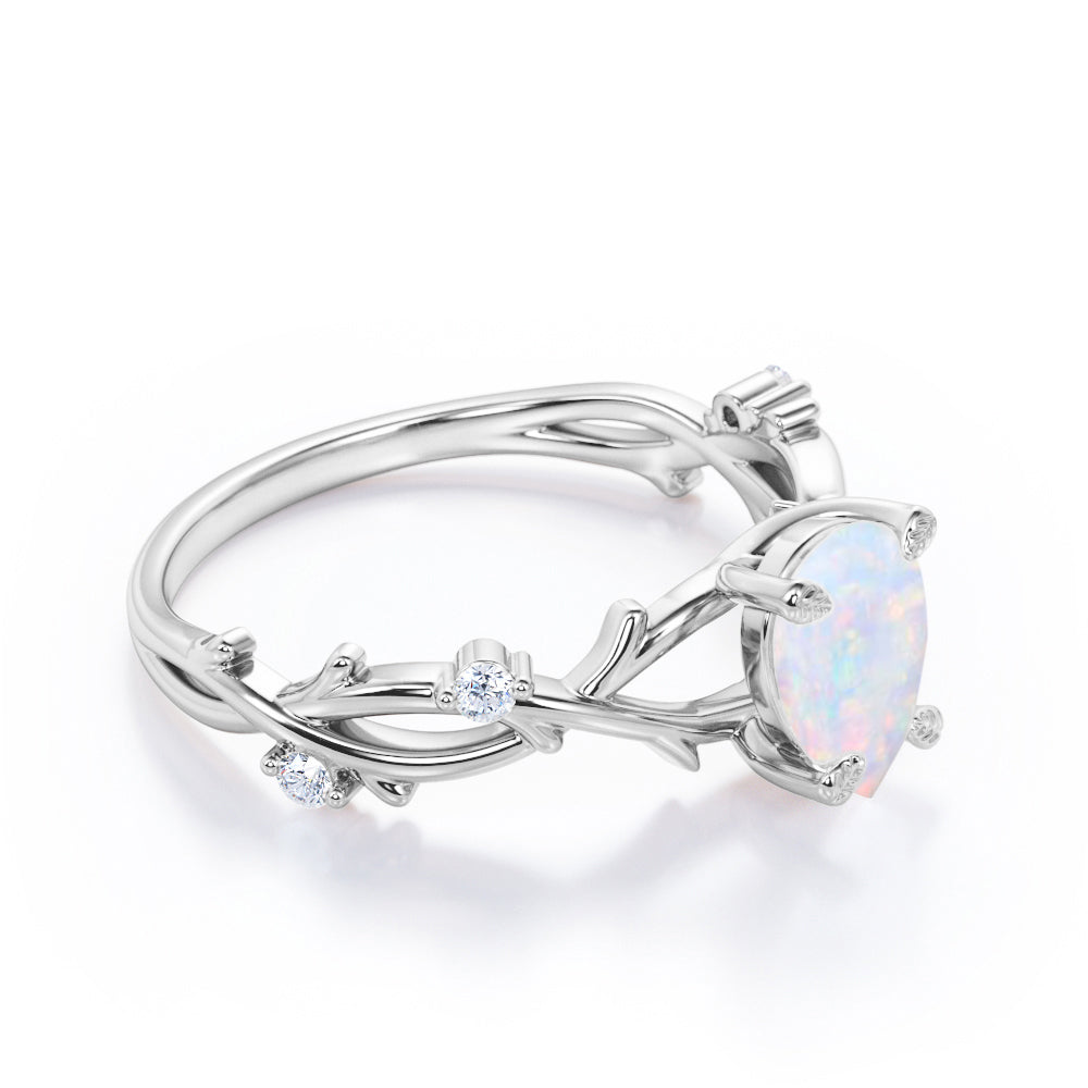Vintage twig 1 carat Pear cut Ethiopian Opal and diamond forest engagement ring in White gold