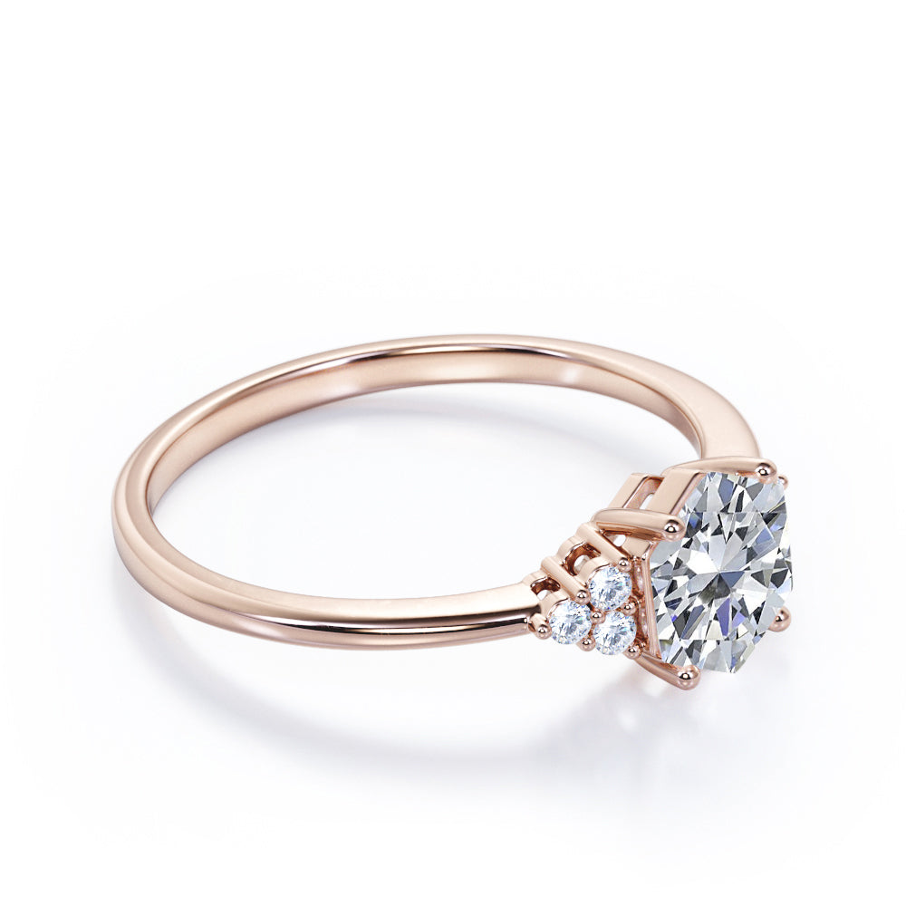 Modern 1 carat Hexagonal Moissanite and diamond tapered knife edge engagement ring in White gold