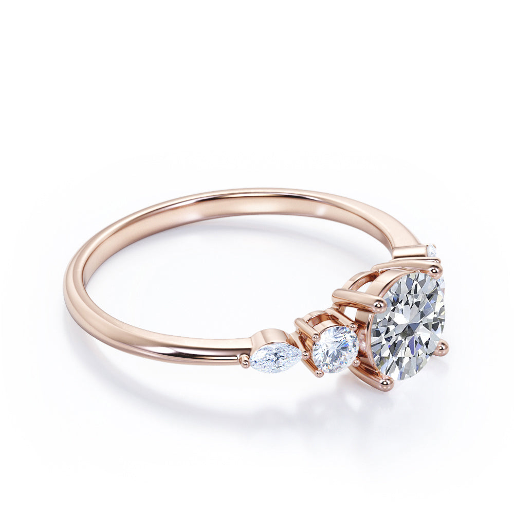 Basket setting 1.15 carat Round shaped Moissanite and diamond 5 stone engagement ring in White gold