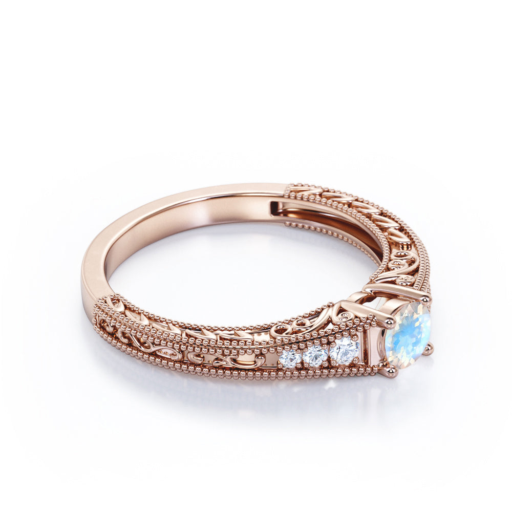 Exquisite Double Beaded 0.6 carat Round cut Moonstone and diamond filigree style engagement ring in White gold