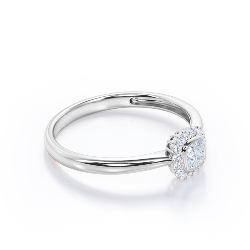 Halo solitaire 0.6 carat Cushion cut Moissanite and diamonds pinched shank engagement ring in yellow gold