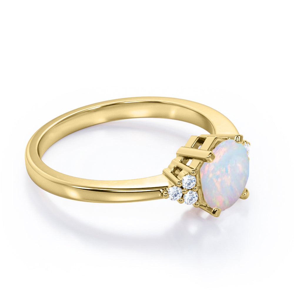 Unique Tapered style 1 carat Round cut Opal and diamond 7 stone engagement ring in Yellow gold