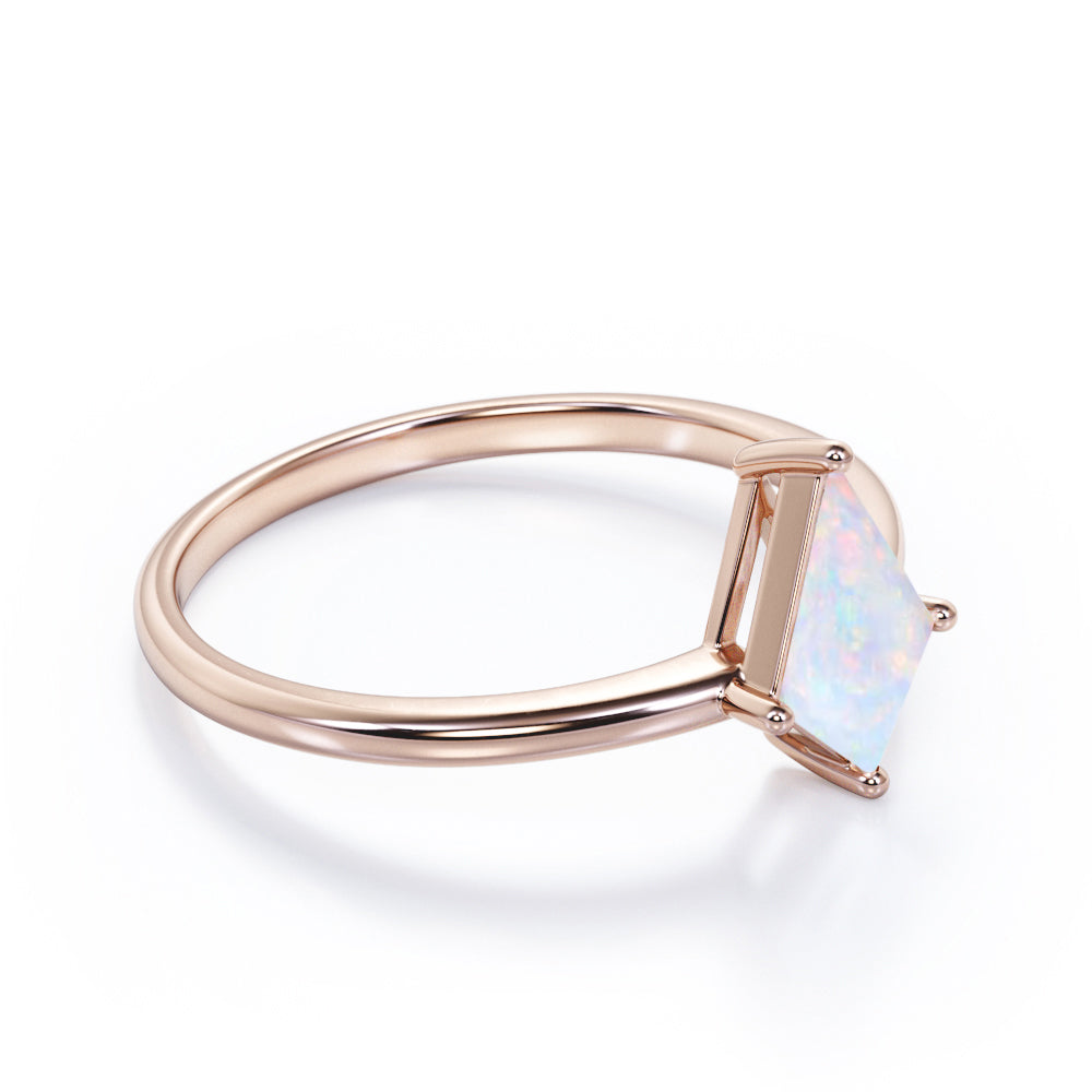Classic 4 prong 1 carat Kite cut Ethiopian Opal solitaire engagement ring in Black gold