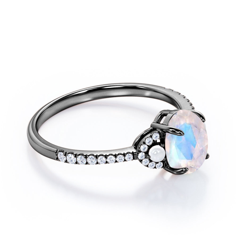 Pretty Pearls 1.5 carat Oval cut Moonstone and diamond traditional engagement ring in White gold