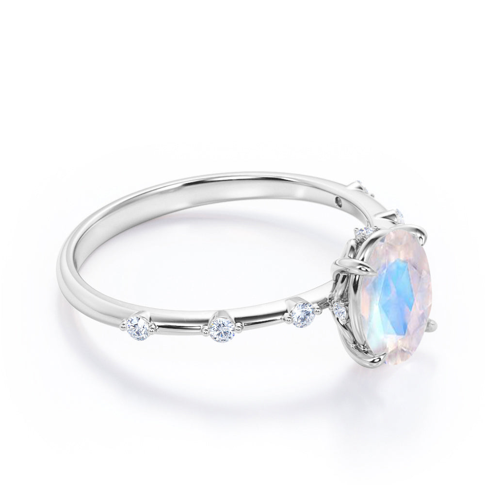 Branch Twig 1.1 carat Oval shaped Moonstone and diamond dainty engagement ring in Black gold