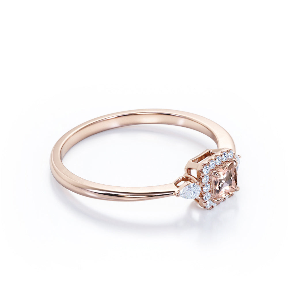 Exquisite three stone 0.75 carat Princess cut Peach Pink Morganite and diamond tapered style anniversary ring in Yellow gold