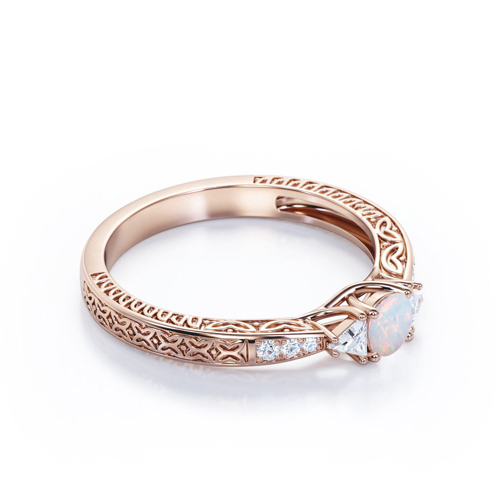 Contemporary style Filigree 0.75 carat Round cut Ethiopian Opal and diamond triangle engagement ring for her