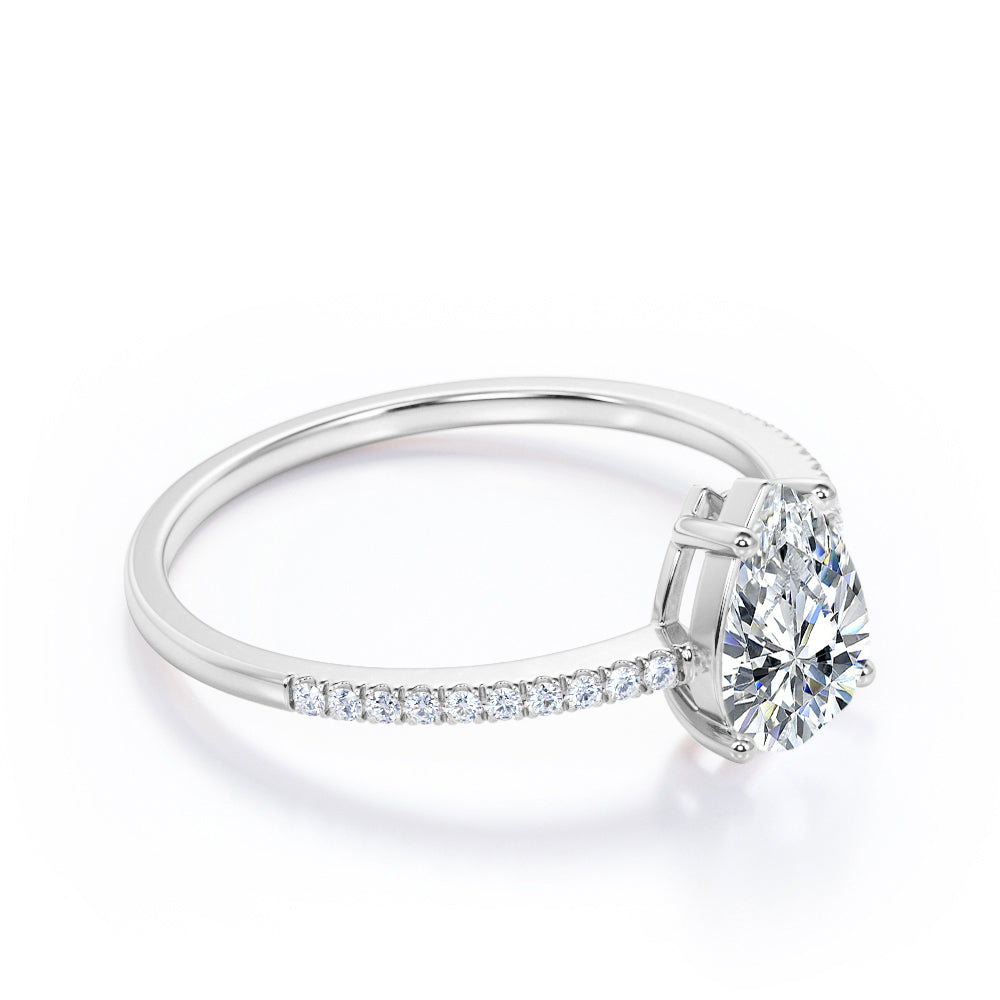 Elegant 1.2 carat Pear shaped Moissanite and diamond vintage prong engagement ring in Black gold
