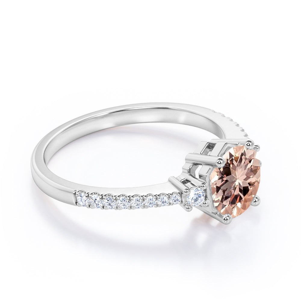 Asymmetric Bezel 1.25 carat Round cut Peach Morganite and diamond eternity style three stone wedding ring set in Yellow gold