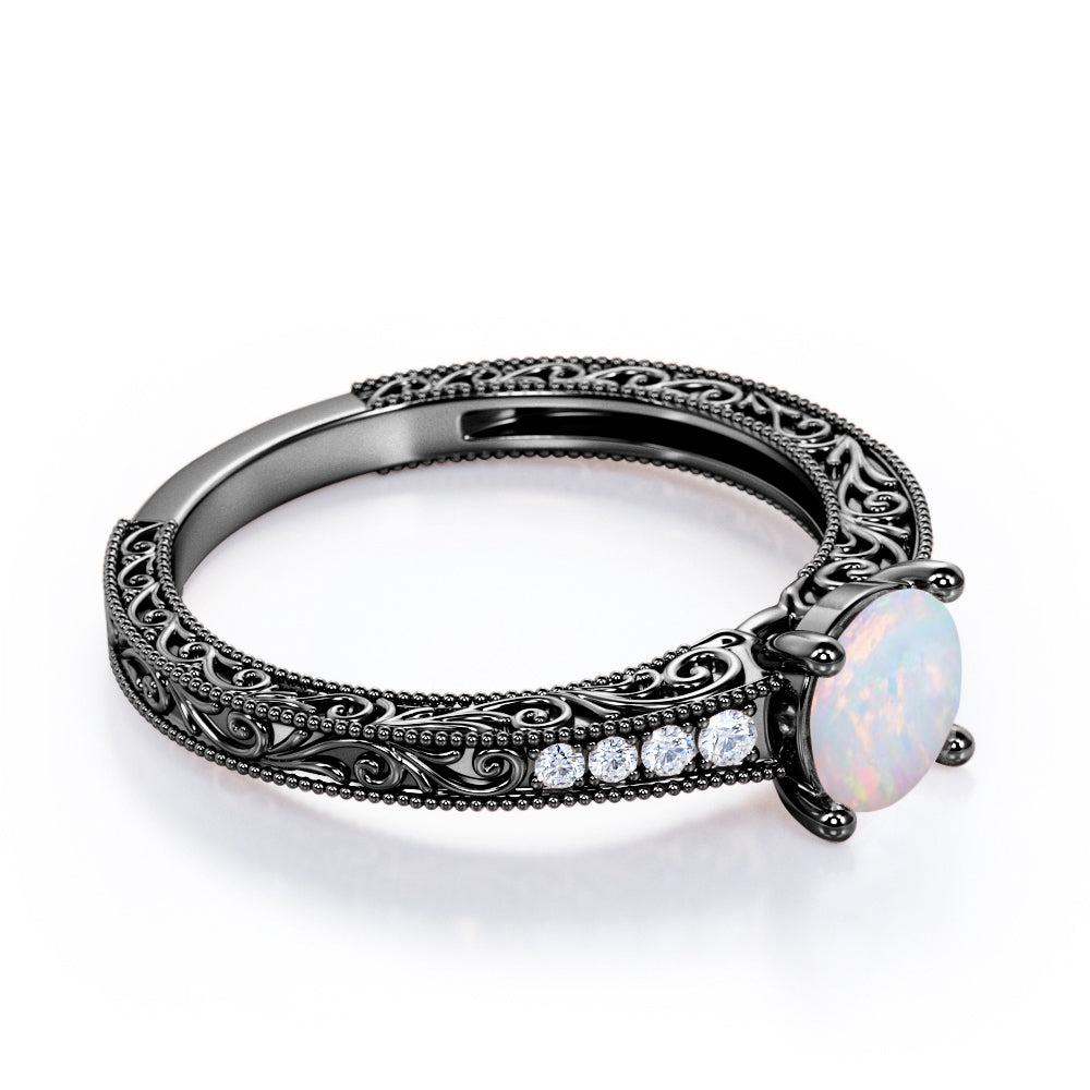 Vintage Edwardian style 1.1 carat Round cut Australian Boulder Opal and diamond filigree and milgrain engagement ring in White gold