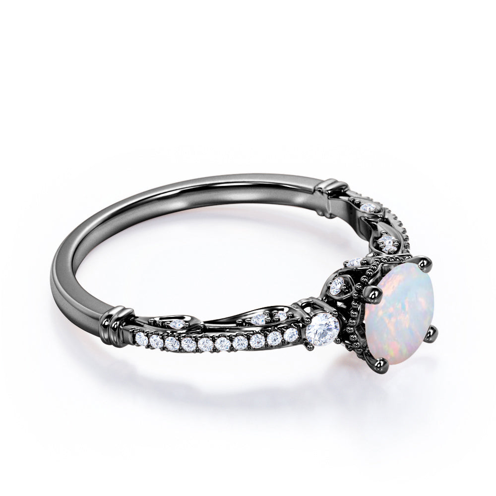Artistic 3 stone 1.30 carat Round cut Ethiopian Opal and diamond antique art deco engagement ring in Black gold