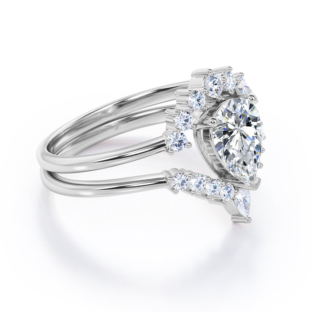 Tiara Inspired 1.25 carat teardrop shaped Moissanite and diamonds Bridal set for women in Rose gold