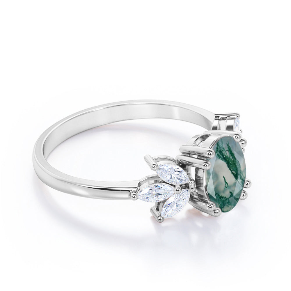 Double prong style 1.15 carat Oval cut Moss Green Agate and diamond seven stone engagement ring in yellow gold