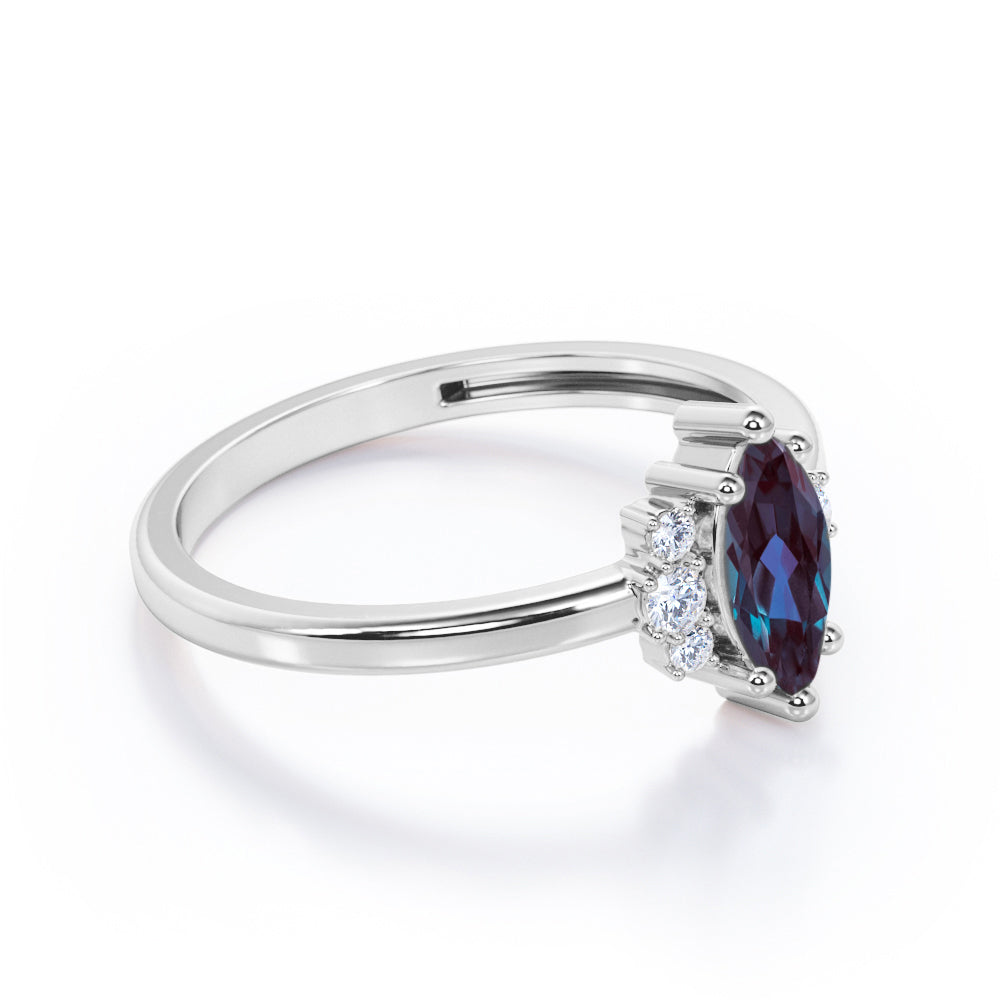 Unique 1.1 carat Marquise shaped Synthetic Alexandrite and diamond floral engagement ring in Black gold