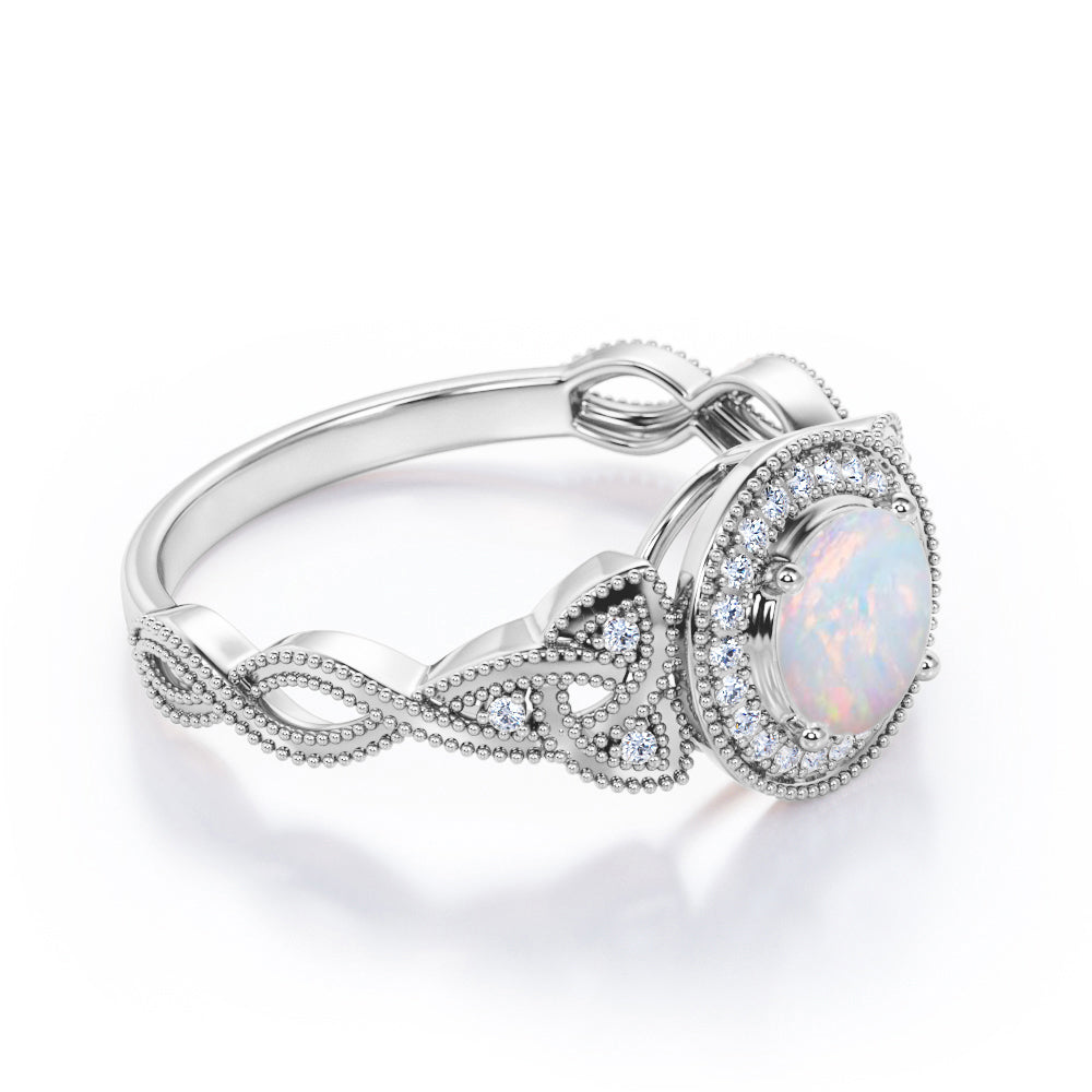 Grandiose 1.30 carat Round cut Ethiopian Opal and diamond twisted infinity halo engagement ring in White gold