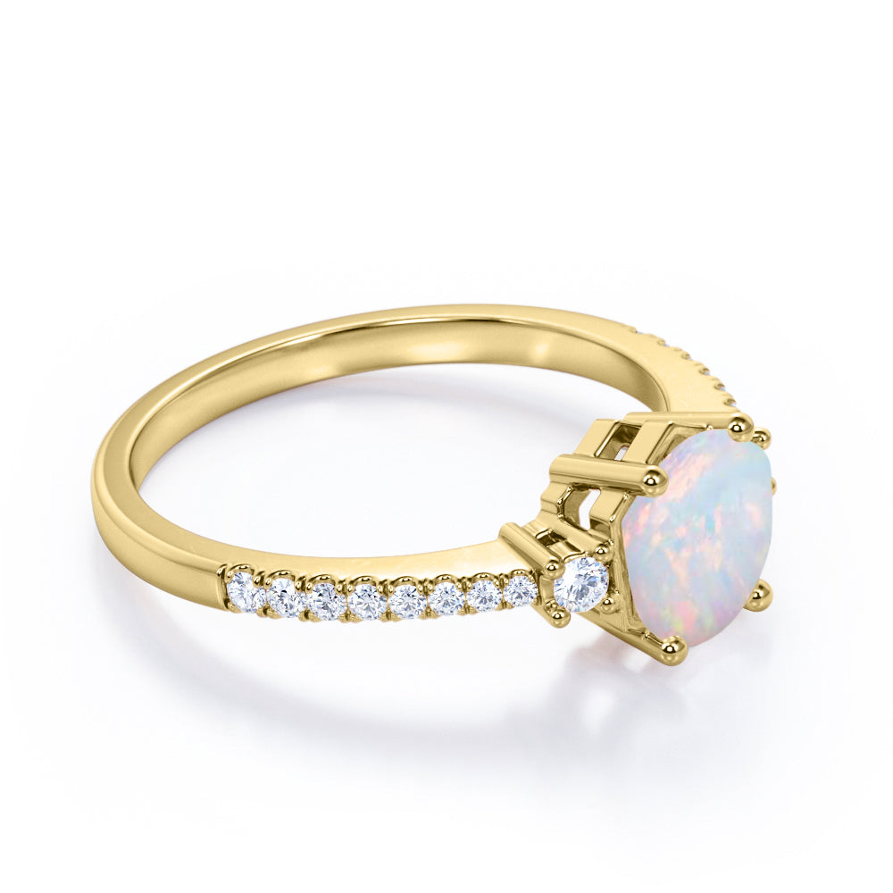 Contemporary 3 stone 1.2 carat Round cut Ethiopian Opal and diamond basket setting low basket setting engagement ring in White gold