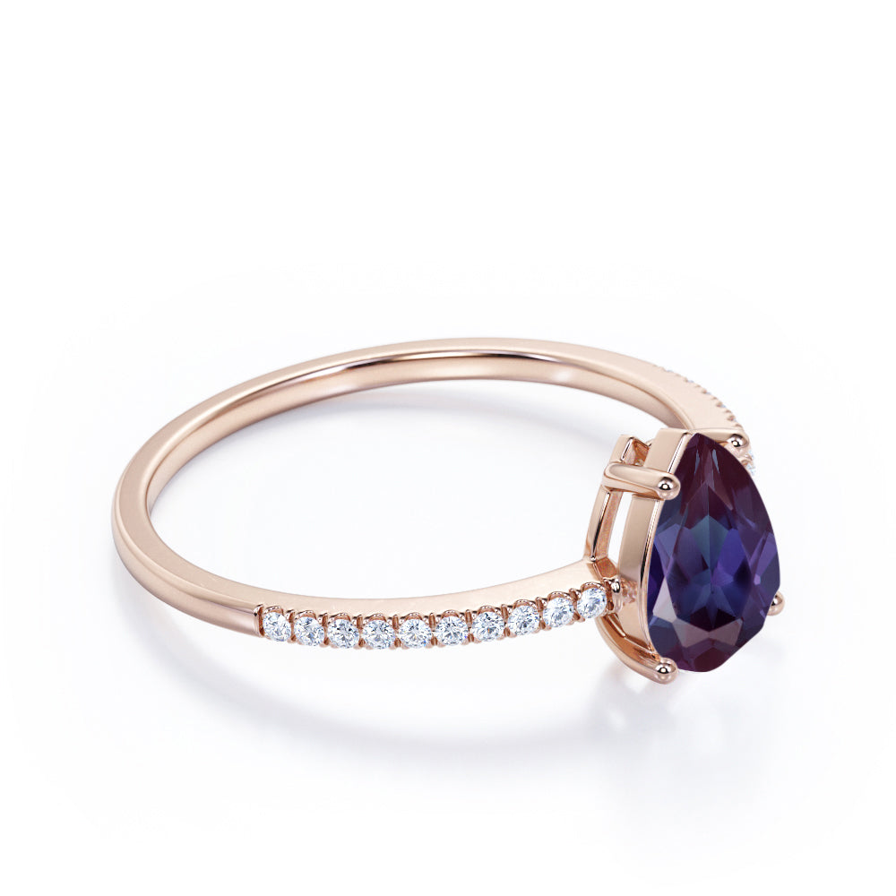 Classic 1.25 carat Pear cut Alexandrite and diamond eternity engagement ring in White gold