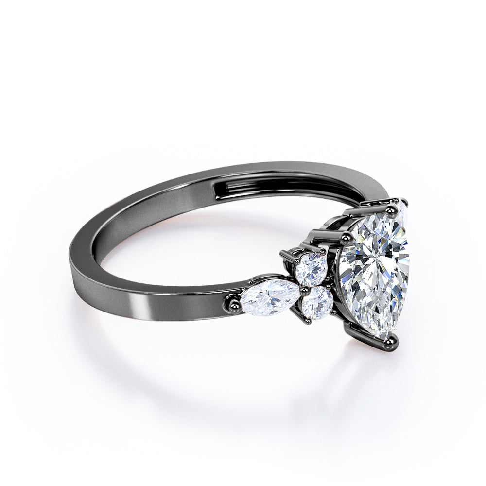Antique 7 stone 1.1 carat Pear Shaped Moissanite and diamond 3 prong engagement ring in Rose gold