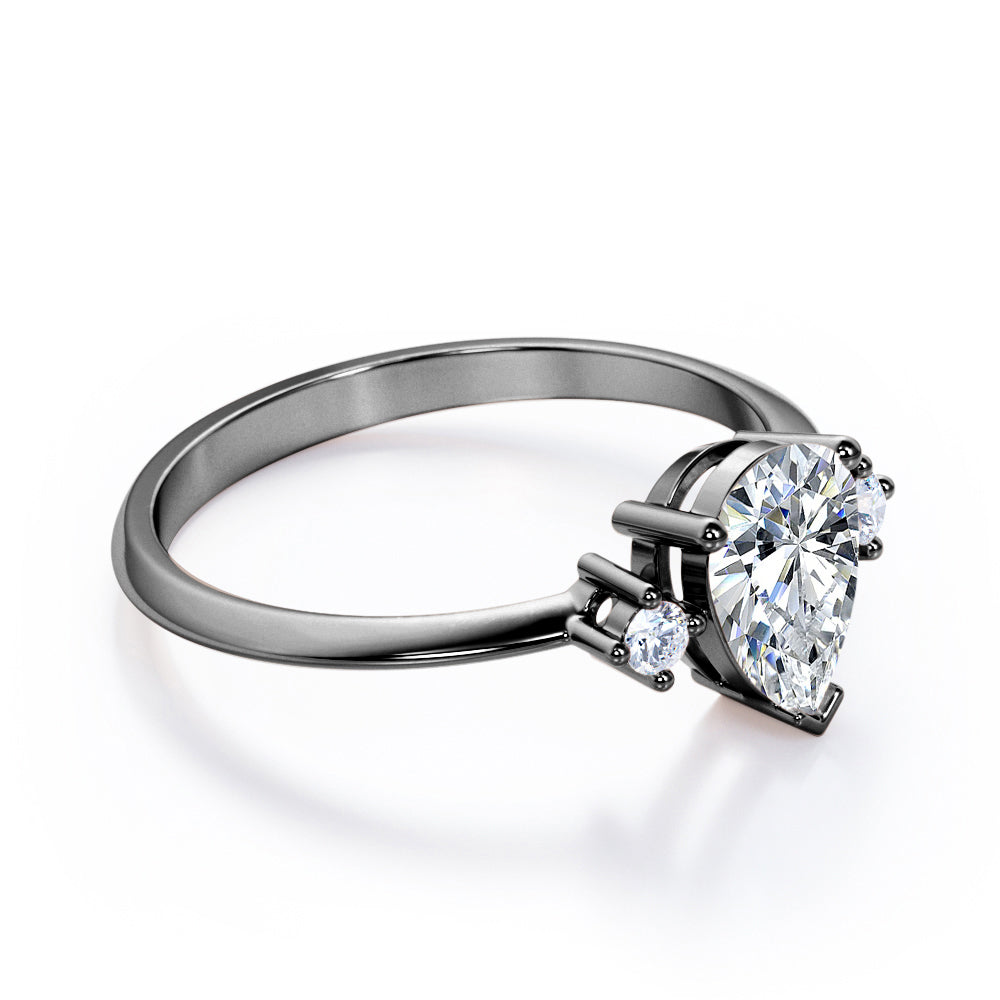 Classic Trinity 1 carat Pear shaped Moissanite and diamond-prong setting-pinched shank engagement ring in White gold