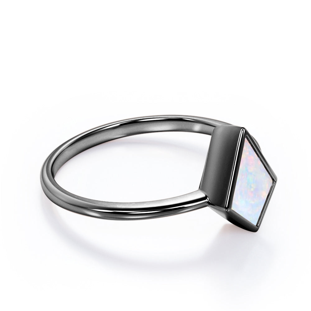 Solitaire Bezel 1 carat Kite shaped Ethiopian Welo Opal tapered shank engagement ring in Rose gold