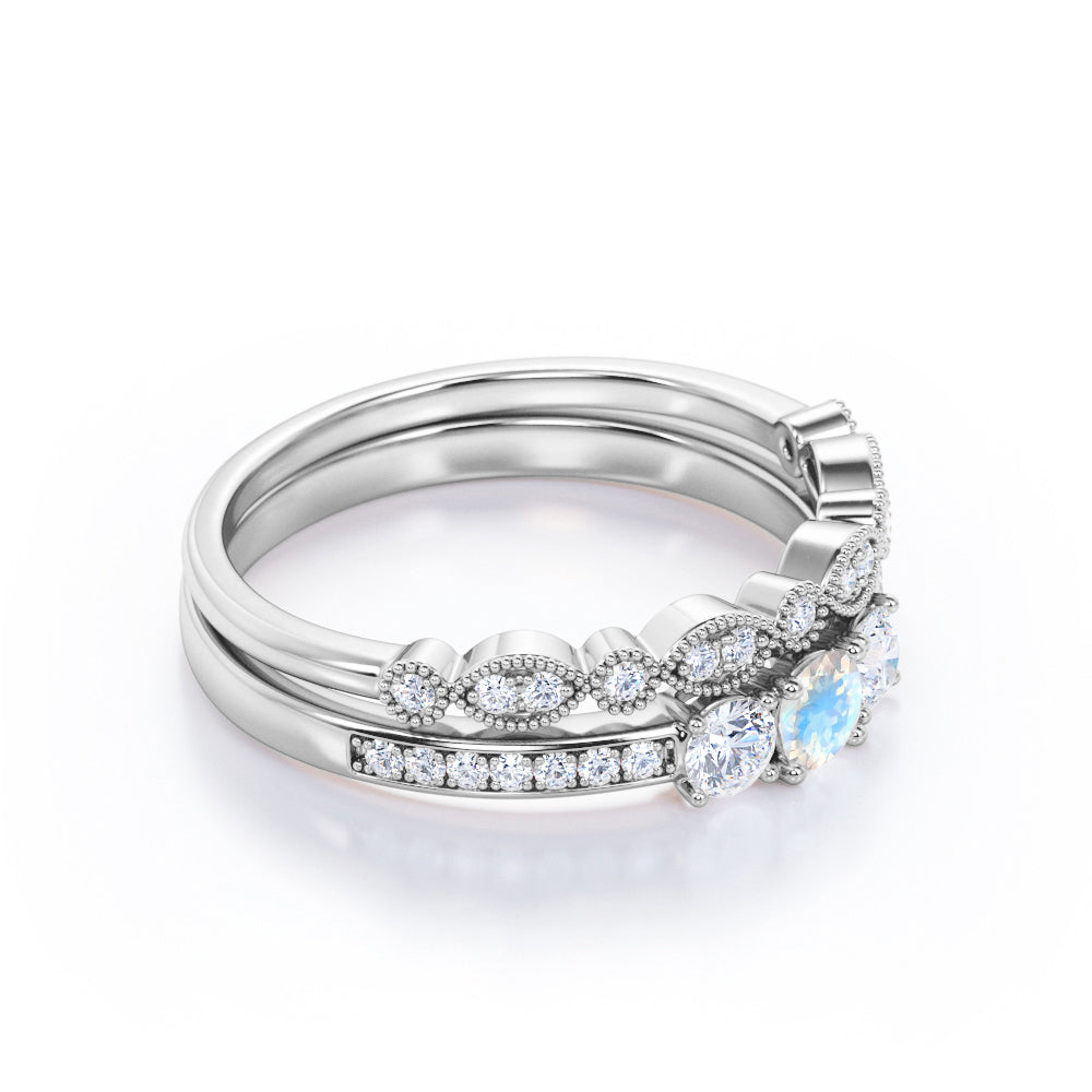 Stylish Channel set 1.55 carat Round cut Moonstone and diamond three stone wedding ring set for her in Rose gold