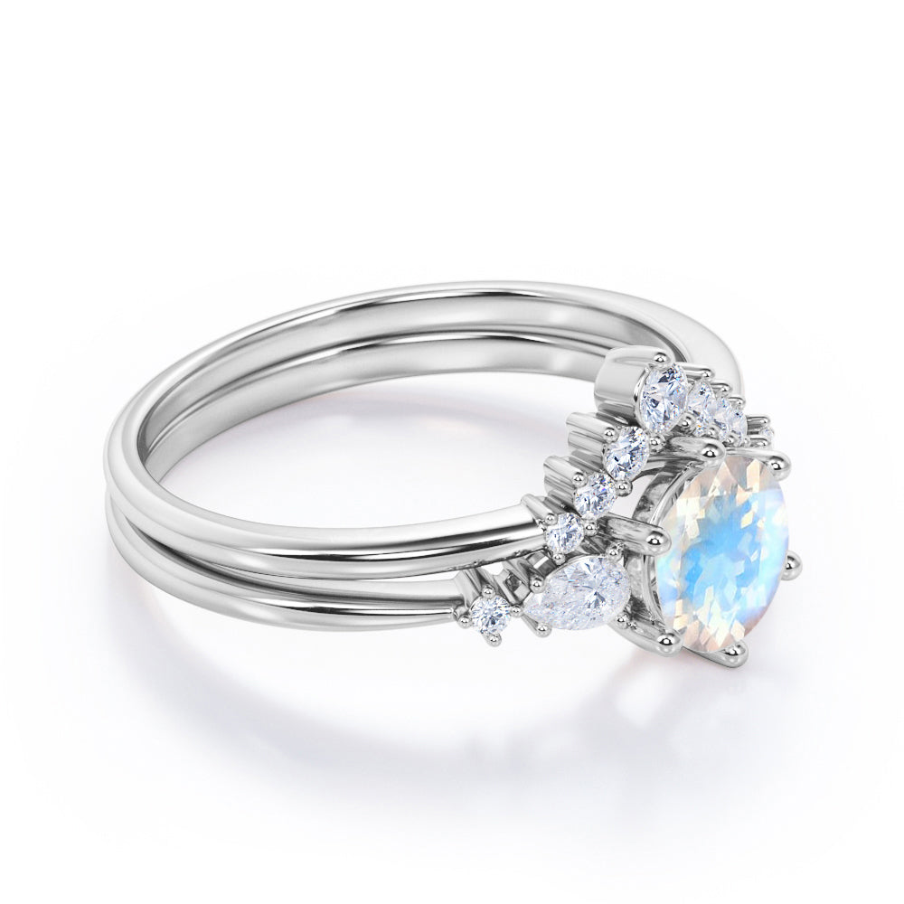 Antique Chevron 1.4 carat Round cut Blue Moonstone and diamond tapered style Bridal set for women in Black gold