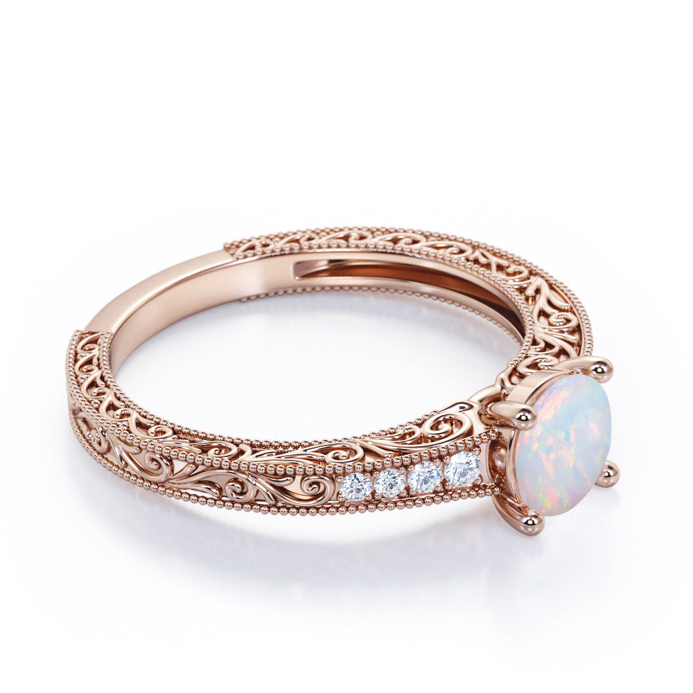 Vintage Edwardian style 1.1 carat Round cut Australian Boulder Opal and diamond filigree and milgrain engagement ring in White gold