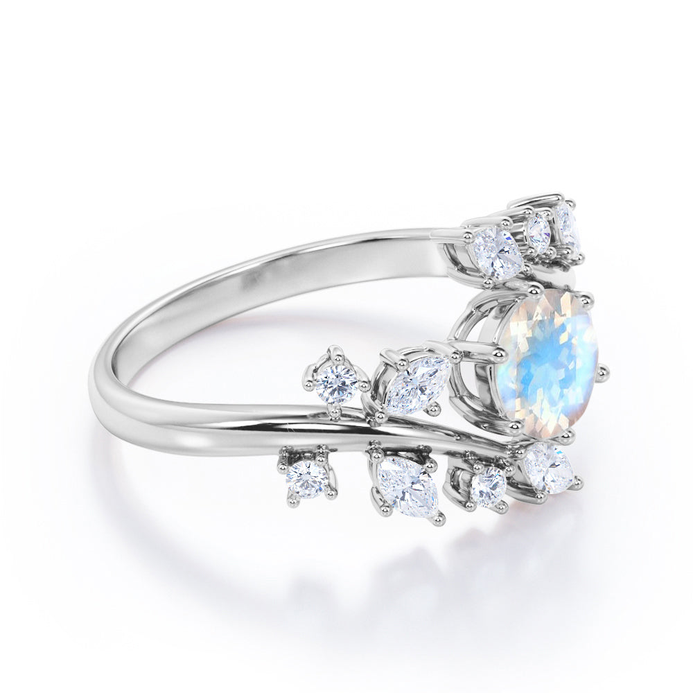 Floral Branch and leaf 1.25 carat Round cut Blue Moonstone and diamond tension set engagement ring in Black gold