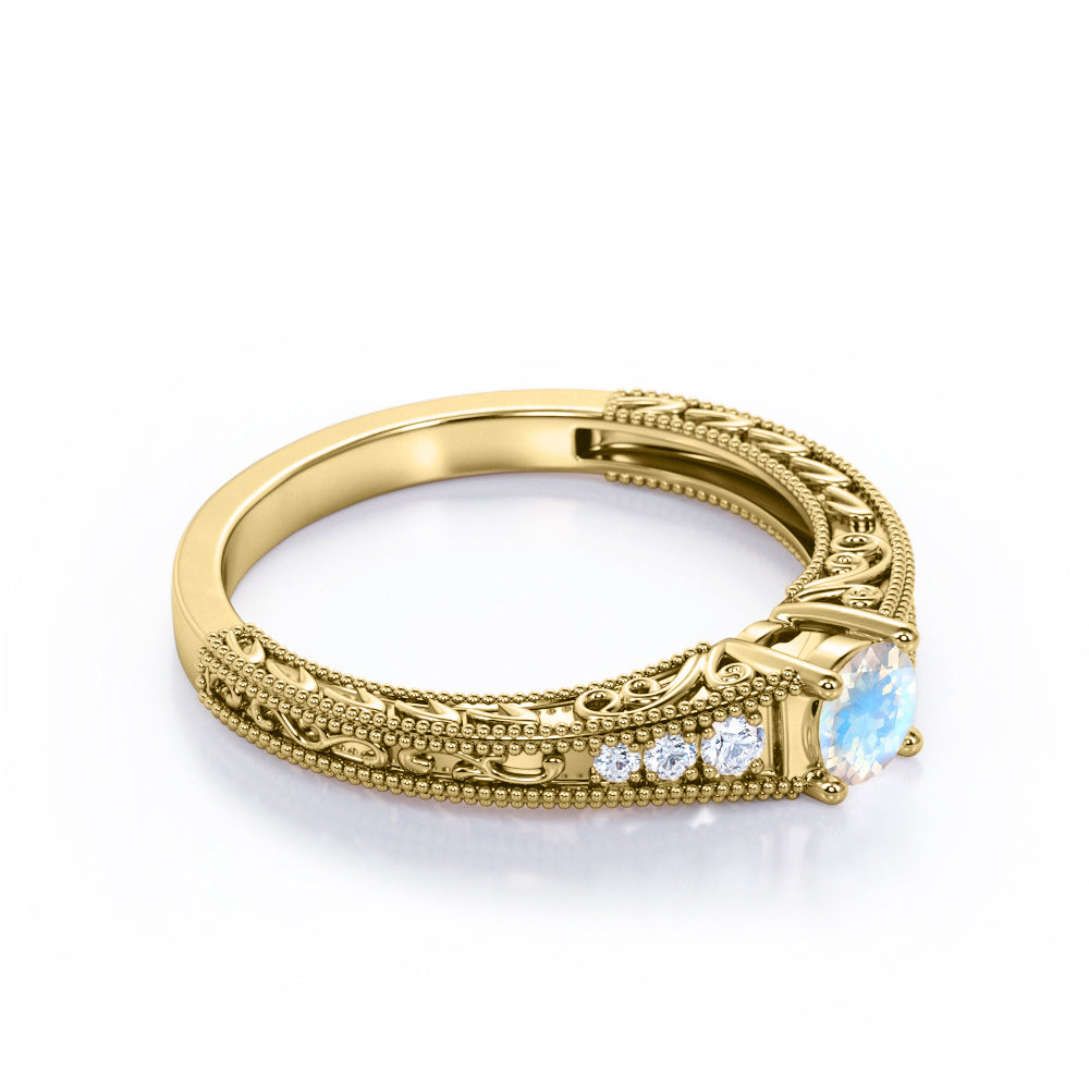 Exquisite Double Beaded 0.6 carat Round cut Moonstone and diamond filigree style engagement ring in White gold