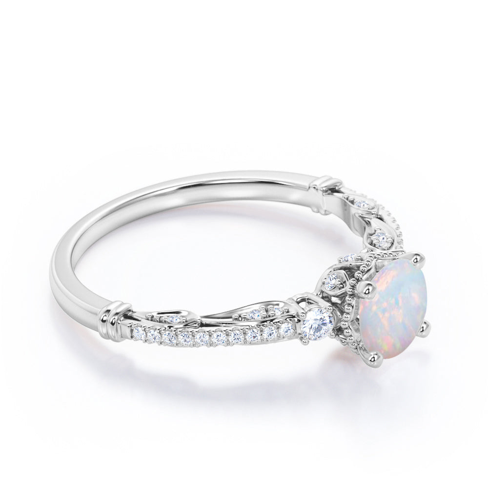 Artistic 3 stone 1.30 carat Round cut Ethiopian Opal and diamond antique art deco engagement ring in Black gold