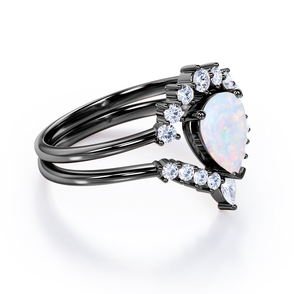 Royal Crown inspired 1.15 carat Pear cut Opal and diamond chevron wedding ring set for women in Rose gold