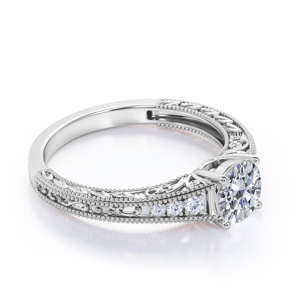 Vintage Tapered style 1.1 carat Round cut Moissanite and diamond Edwardian filigree engagement ring in rose gold