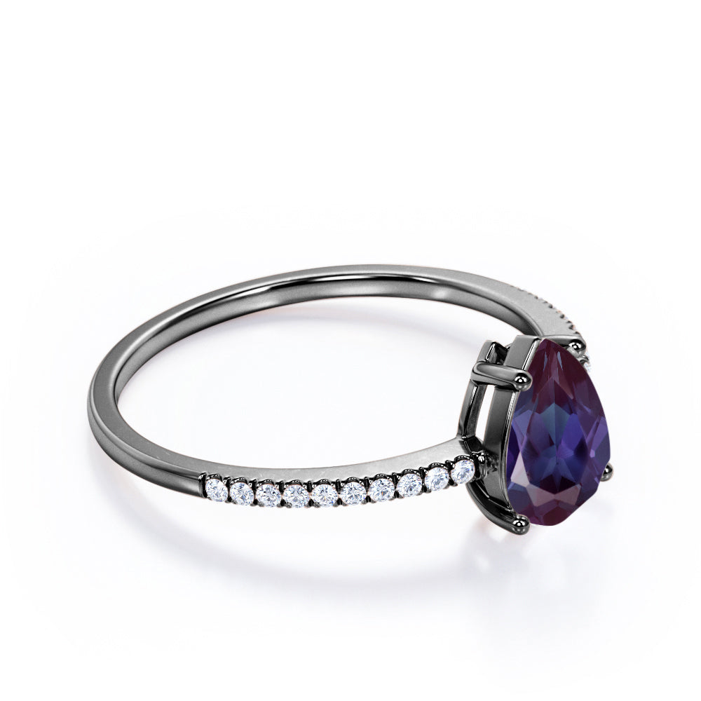 Classic 1.25 carat Pear cut Alexandrite and diamond eternity engagement ring in White gold