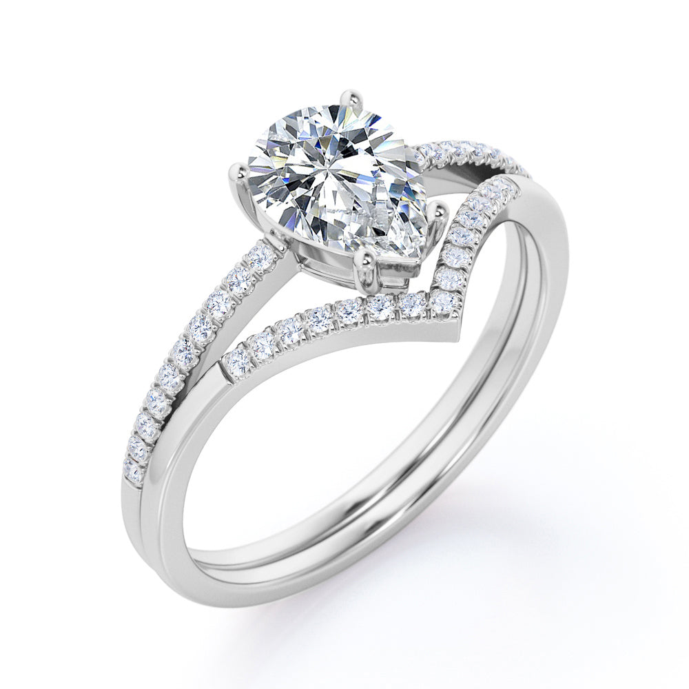 Vintage inspired 1.35 carat Pear cut Moissanite and diamond crown wedding ring set for women in rose gold