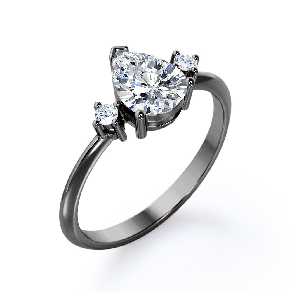 Classic Trinity 1 carat Pear shaped Moissanite and diamond-prong setting-pinched shank engagement ring in White gold