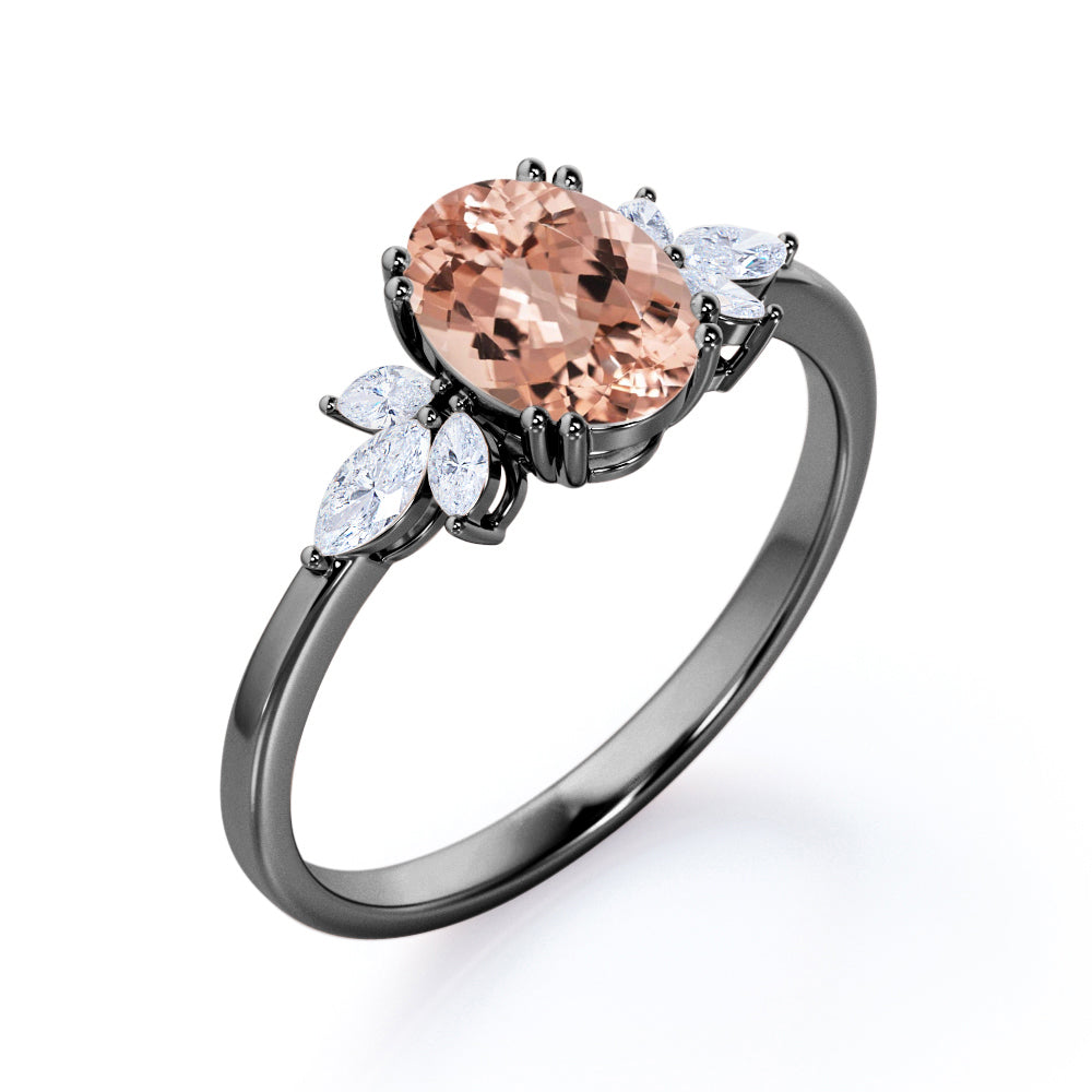 Double Prong 1.25 carat Oval Shaped Morganite and Marquise diamond engagement ring in White gold