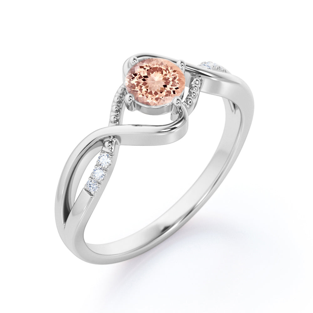 Infinity Twisted 1.15 carat Round cut Morganite and diamond Milgrain anniversary ring for women in Black gold