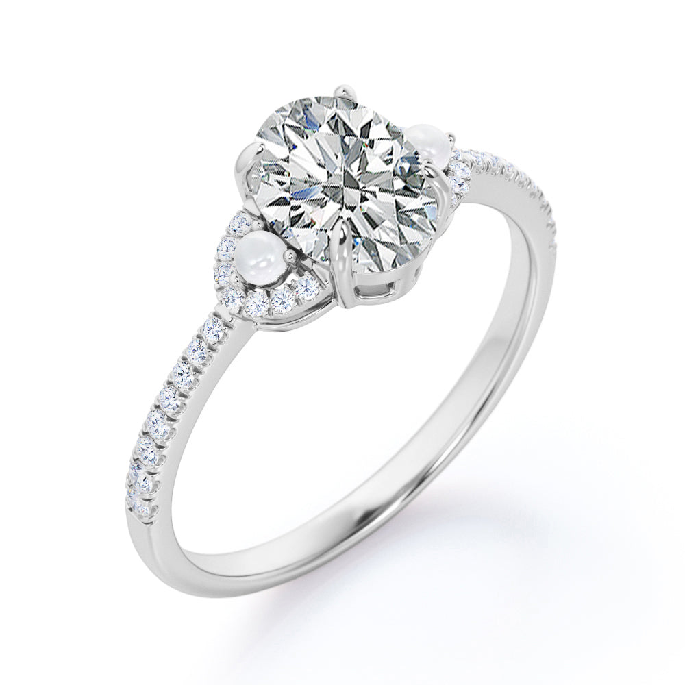Vintage crescent style 1.35 carat Oval cut Moissanite, diamonds and freshwater pearl engagement ring in Rose gold