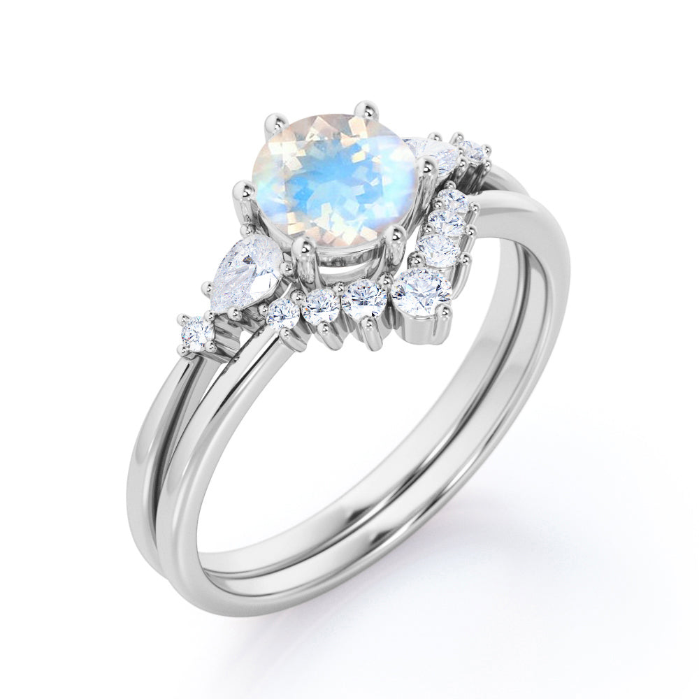 Antique Chevron 1.4 carat Round cut Blue Moonstone and diamond tapered style Bridal set for women in Black gold