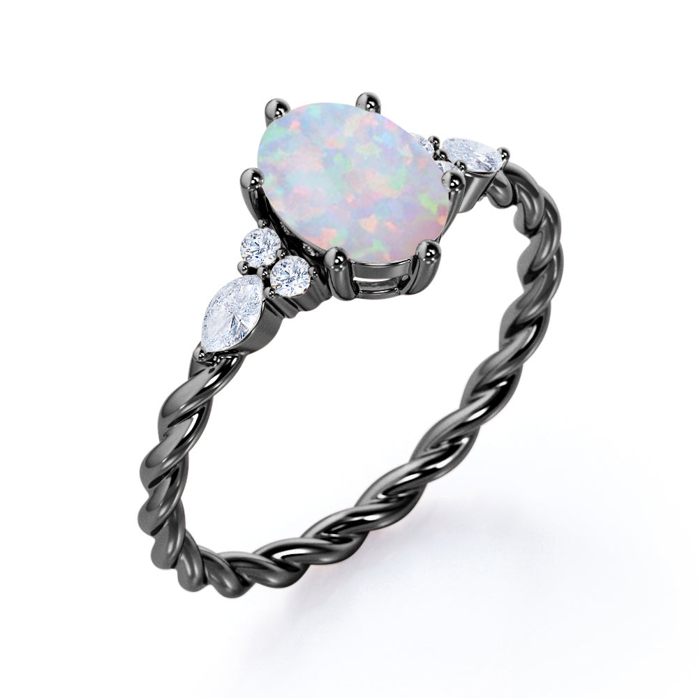 Twisted style 1.25 carat Oval shaped Opal and diamond 6 prong engagement ring in White gold