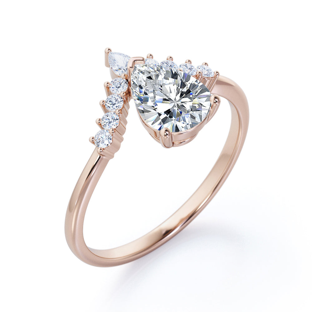Antique V-shaped 1.15 carat Pear cut Moissanite and diamond engagement ring in White gold