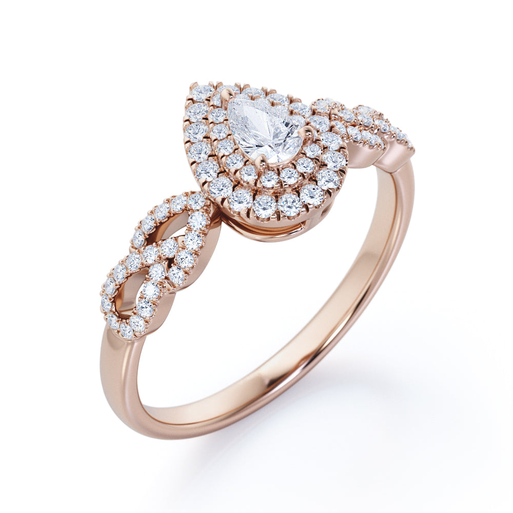Stylish leaf inspired 0.75 carat Pear cut diamond double halo pear engagement ring in White gold