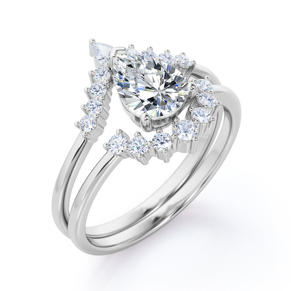 Tiara Inspired 1.25 carat teardrop shaped Moissanite and diamonds Bridal set for women in Rose gold
