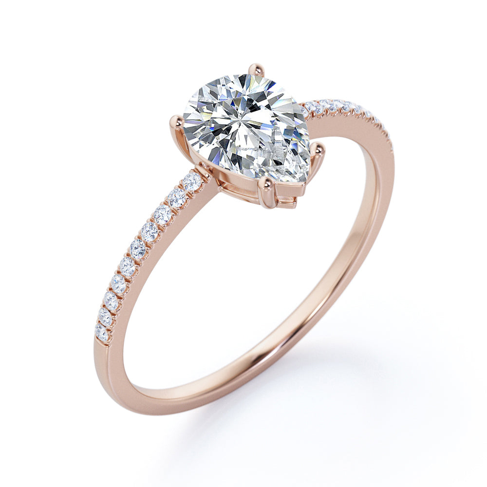 Elegant 1.2 carat Pear shaped Moissanite and diamond vintage prong engagement ring in Black gold