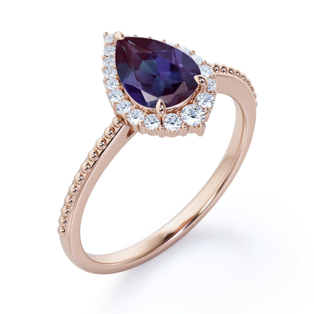 Crown Milgrain 1.25 carat Pear shaped Synthetic Alexandrite and diamond halo style engagement ring in Rose gold