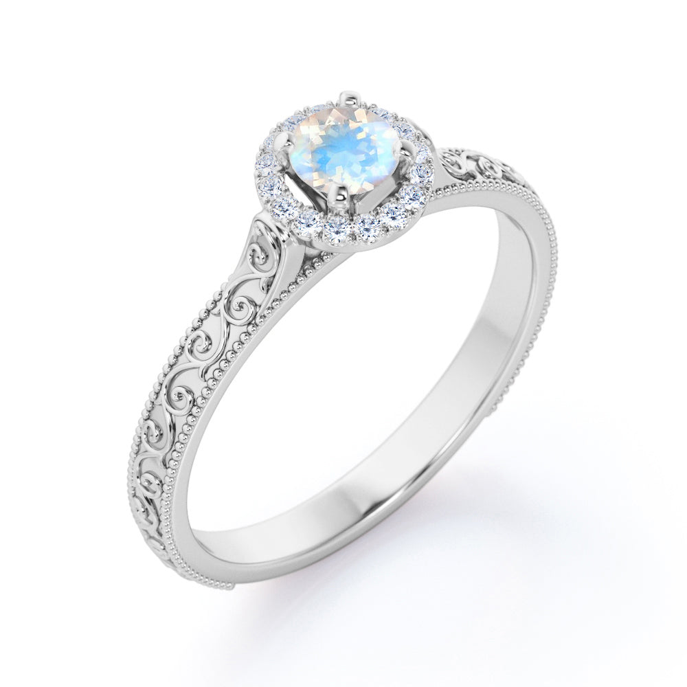 Ornamental Filigree 1.2 carat Round cut Moonstone and diamond halo engagement ring for women in Rose gold