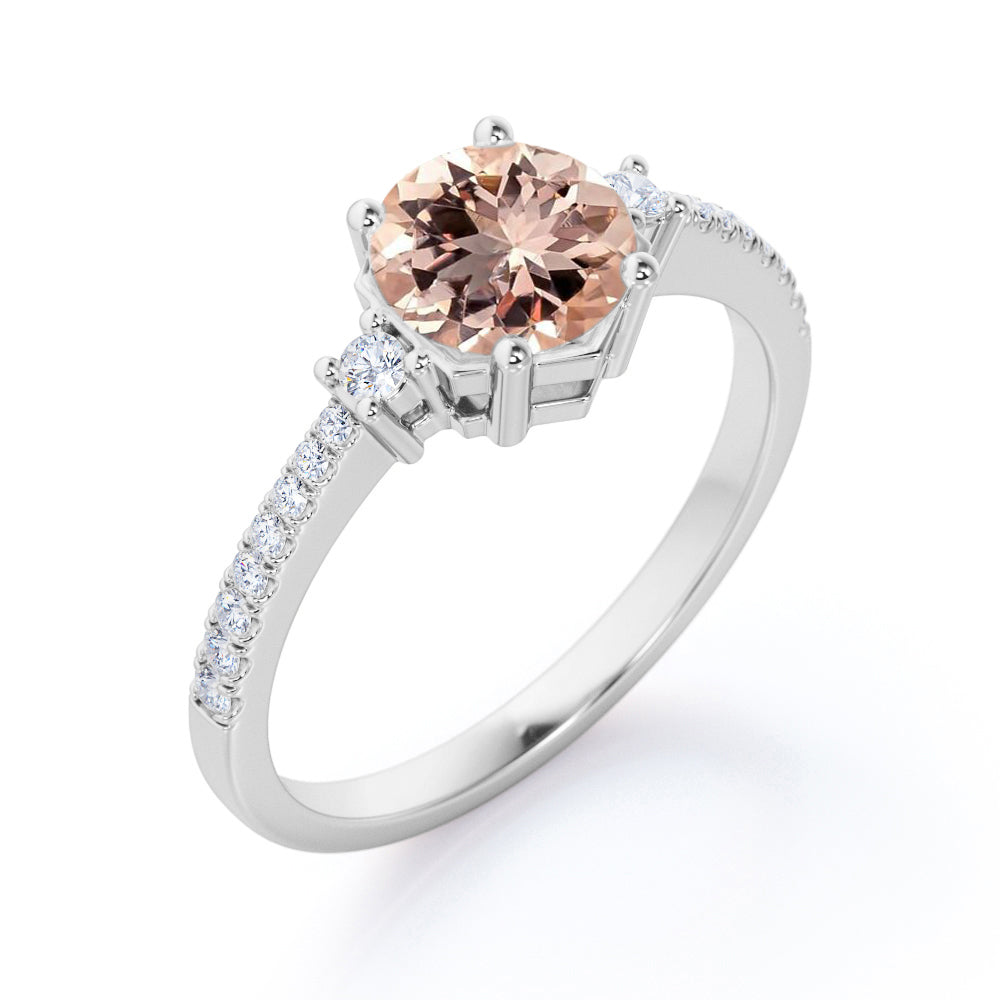 Asymmetric Bezel 1.25 carat Round cut Peach Morganite and diamond eternity style three stone wedding ring set in Yellow gold