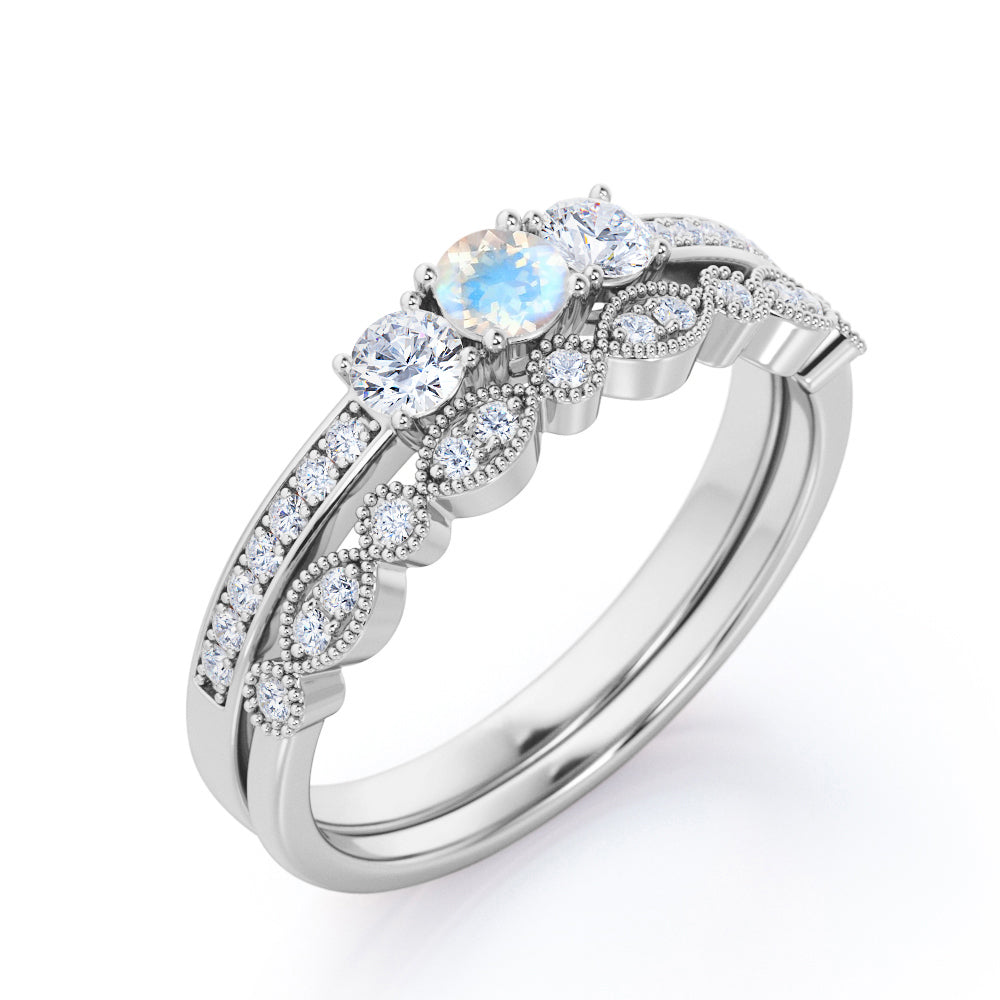 Stylish Channel set 1.55 carat Round cut Moonstone and diamond three stone wedding ring set for her in Rose gold