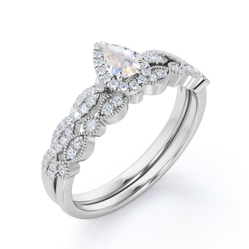 Art deco Milgrain 1.65 carat Pear cut Moonstone and diamond twisted pave engagement ring in yellow gold