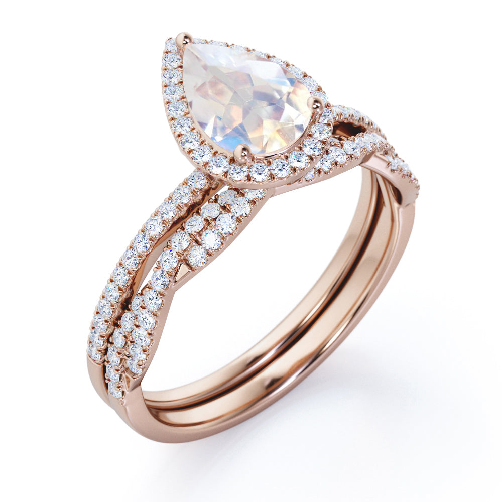 Exquisite 1.75 carat Pear cut Rainbow Moonstone Engagement ring with matching half eternity wedding ring band in gold